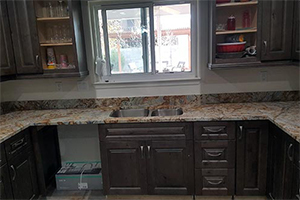 African Canyon Granite Countertops & Tahoe Ash Cabinets